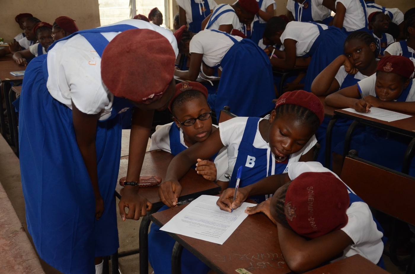 Students writing their questions at Our Lady of Apostles